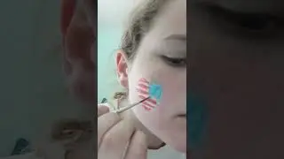 Painting a USA flag heart #facepaint #art