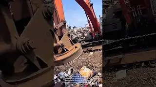 Magnetic Power: Excavator Cleans Up Scrap Metal