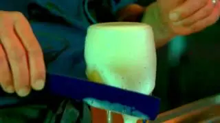 BAVARIA - Pouring the perfect Dutch pint.