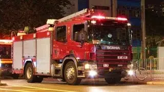 HONG KONG FIRE DEPARTMENT SCANIA ENGINES RESPONDING TO EMERGENCY