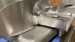 Elegant design - the Hobart 410 deli meat slicer.