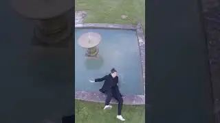 Woman Falls Backwards into Fountain