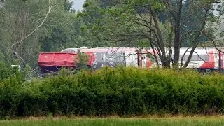 Several injured after train hits tractor at level crossing | SWNS