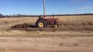 Disking a firebreak ..