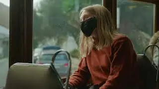 Girl Tram Smartphone Face Mask   Stock Video Footage Stock Video Footage