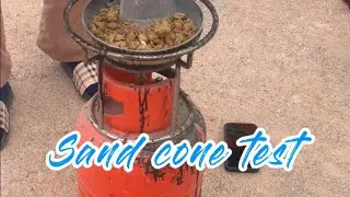 Sand cone test for soil backfilling work at site fields