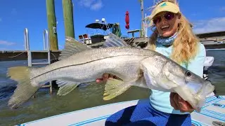 BATTLE under the Docks! Surprise Snook 
