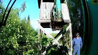 2022 Using the small excavator to move a hunting tower.
