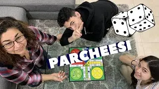 PLAYING PARCHEESI