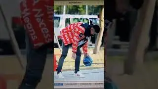 Kris Wu having Crew Cut & wearing a Red Down Jacket & playing Basketball
