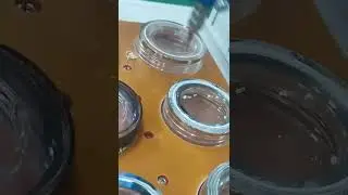 3-axis automatic LED headlamp sealing silicone dispensing machine by Dilong. Full-auto dispenser for