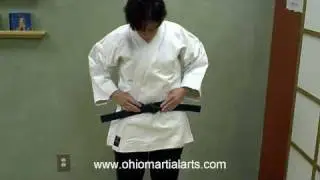 A simple way for young people to tie a Martial Arts belt.