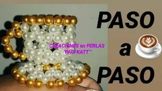 Taza de té hecha con perlas. Xícara de chá com miçangas. Tea cup with beads