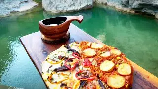 Cast iron pizza on a campfire technique (meat)
