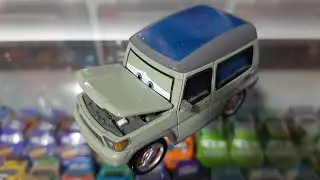 Mattel Disney/Pixar Cars 2 Miles Axlerod with Open Hood (World Grand Prix) Palace Chaos 2013 Chase