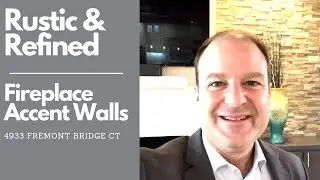 Edmond Homes for Sale in Twin Bridges with stacked stone accent walls at the fireplace