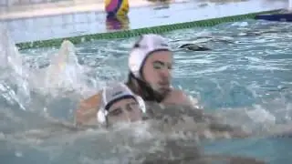 Pan Am water polo players on rough play below the surface
