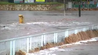 Isa St Bridge in flood