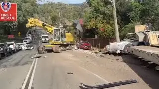 Mass clean-up after crane truck crashes into 11 cars in Sydney