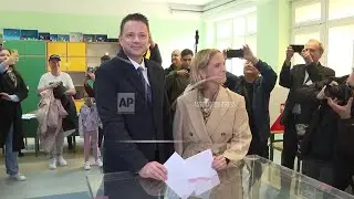 Polish presidential frontrunner Trzaskowski casts his vote