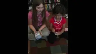 Madison and Bailey opening Comic Con toys