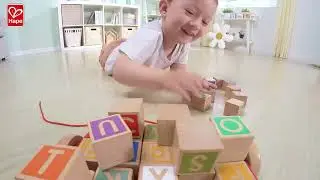 Hape E0487 Pull along Cart with Stacking Blocks