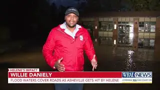 Flood waters cover roads as Asheville gets hit by Helene