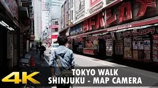 Zu Fu&szlig; in Tokio. Shinjuku Station zur Karte Kamera - 4K
