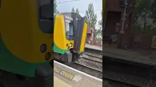 Ritchie catching a glimpse of a London northwestern Railway class 350 at Marston Green