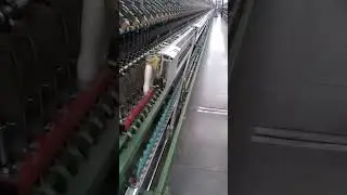 RIETER G-33 RING SPINNING MACHINE, AUTO DOFFING ON COMPLETION OF YARN PACKAGES.