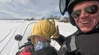 Snowmobiling on the Moose River, between Moosonee and Moose Factory