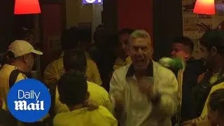 Lone England fan celebrates in middle of Colombian bar