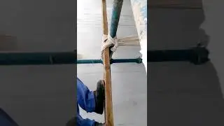 Pipe fitting through scaffolding.