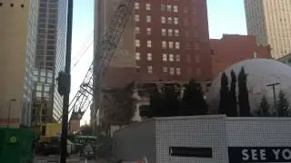 Demolition of a 100-year-old building downtown Dallas Texas