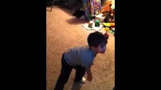 Jonathan dancing to the Wii - Just Dance Kids.