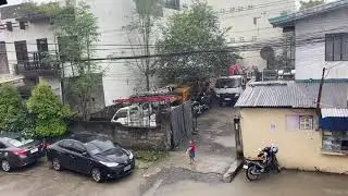Typhoon Auring PH just landed in Davao and the little girl is enjoying the rain #shorts