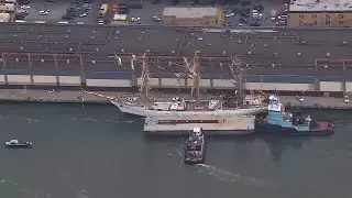 Marine units towing Mexican Navy ship after hitting Brooklyn Bridge