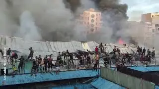 Hundreds of shops gutted in market fire in Bangladesh