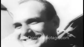 1942 Jackie Coogan hollywood star enlists in WWII archival footage