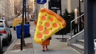 Going to the mall with a giant inflatable slice of pizza