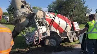 Uprighting a cement truck on Route 98, Batavia