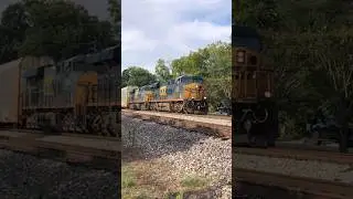 CSX hustling a long auto rack train along, doing it elephant style!