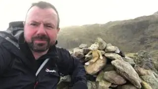 Hail storm builds up on CALF CRAG summit.
