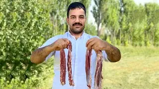 traditional cooking of lamb fillet with potatoes in village