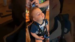 Twin toddlers' adorable first haircut experience