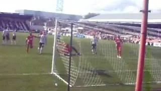 Byron Moore scoring a goal for Crewe against Grimsby 15/8/09