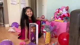 Unwrapping presents! L.O.L. Toys and more.