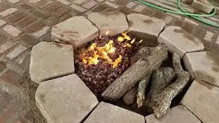 DIY Dual Half propane gas fire pit and half wood burning campfire.