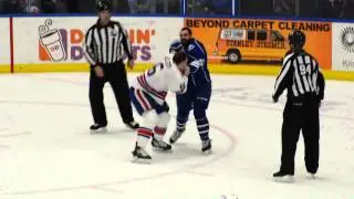 Crunch's Broll fights the Amerks' Pelech