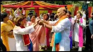 US Commerce secretary Gina Raimondo, Indian Defence minister Rajnath Singh celebrate Holi.